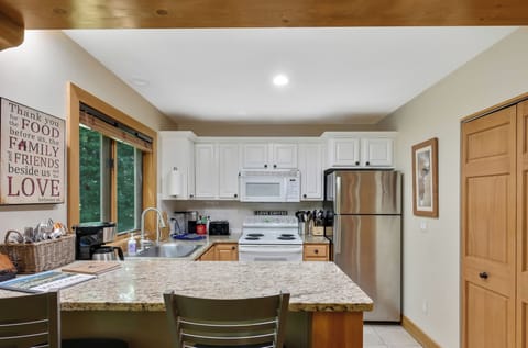 Full kitchen on main level stocked with lots of great extras to enjoy.
