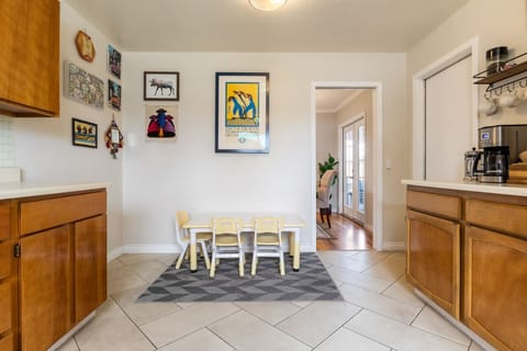 Kids table to hangout in the kitchen. One of many kid hangouts in this home.