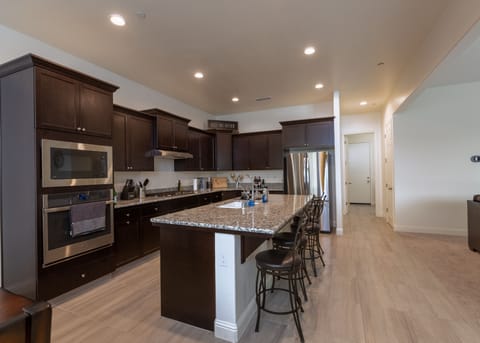 Comfortable bar seating for quick meals, morning coffee, or conversation.