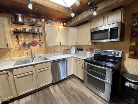 Fully furnished kitchen with gas range