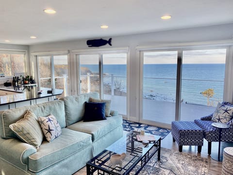 Three siders take you to the huge deck! Also enjoy the wine & beverage center!