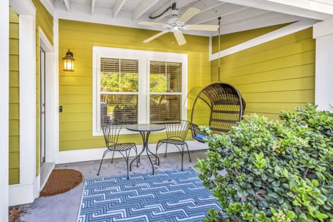 Front Porch with Bistro Table and a Swing