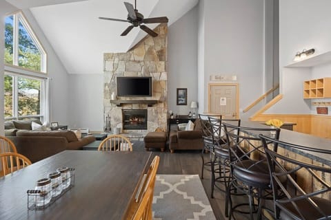 Open floor plan dining room, kitchen, living room.