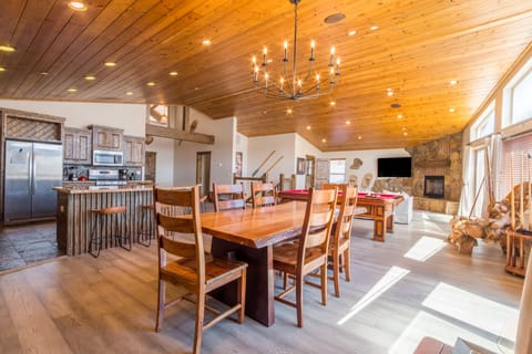 Large interior dining table features seating for six.