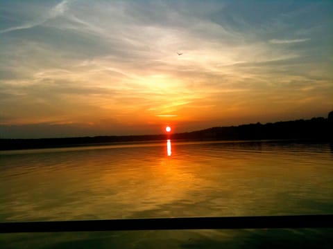 photo of highland lake at sunset