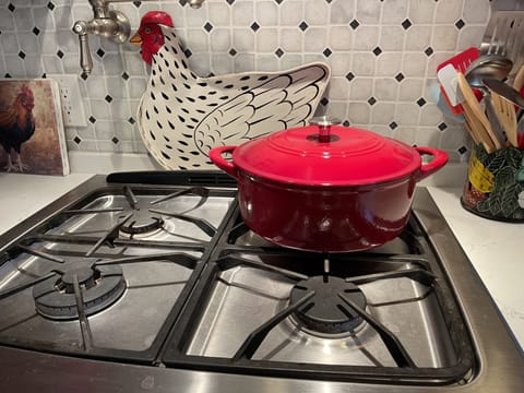 Full kitchen stocked w/pots/pans/utensils, gas stove, dishwasher, microwave...