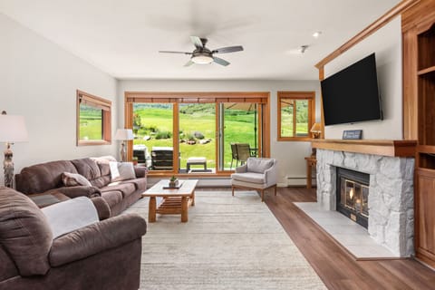 Living room with wood-burning fire place