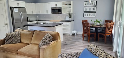 Open concept kitchen, living room and dining.