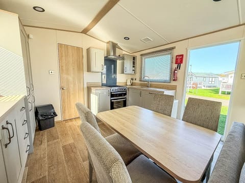 This dining table is perfect for everything from family breakfasts to evening board games, creating an inviting hub for socialising and planning tomorrow's adventures in Hunstanton, Norfolk.