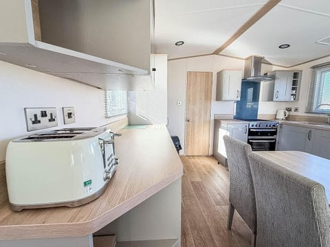 Whether you are preparing a delicious breakfast or unwinding with a movie after a busy day on the Norfolk coast, the open plan lounge offers a space where everyone can stay connected.