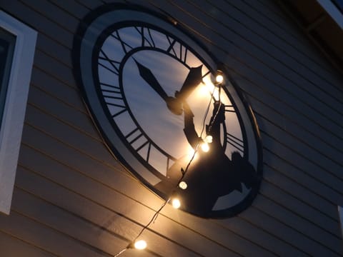 Doc Brown hangs from the clock tower!