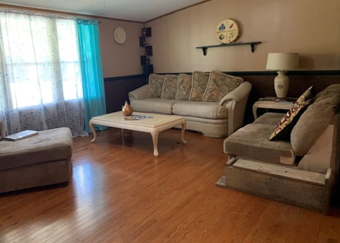 Large living room area. Plenty of seating. 