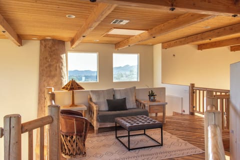 2nd floor loft constructed of knotty pine wood