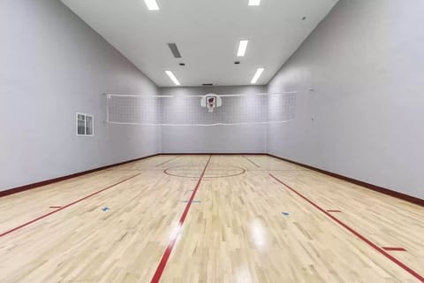 Enjoy your own indoor basketball court/volleyball court.  This room is located just off of the arcade.  