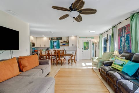 The open concept main space includes a living room, dining area and kitchen, great for spending time together.