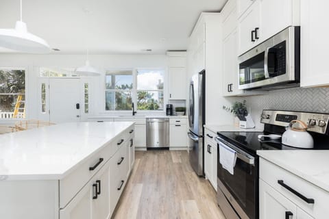 Spacious Chef’s Kitchen with Ample Countertops – Designed for convenience and style.