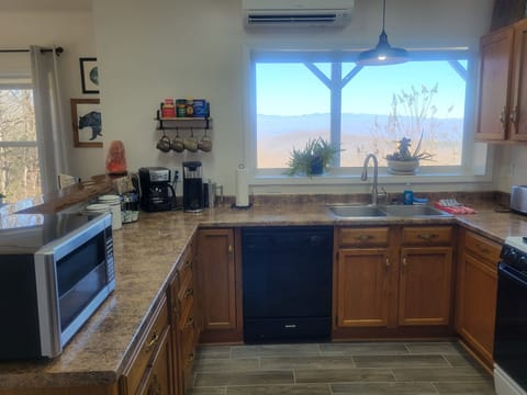 Dishwasher, gas stove and full size refrigerator.  