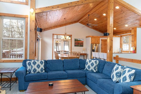 Cozy up in the living room on the large sectional couch with a roaring fire.