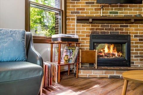 Listen to some classic records by the fireplace.