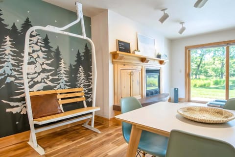 Authentic & refurbished 1960s ski lift chair modified into a comfy bench. 