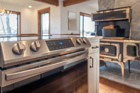 Brand new electric range and cooktop make prepping meals a breeze.