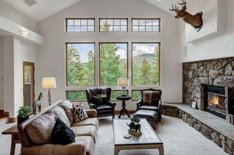 Main living area Open floorplan, big views, large fireplace and large screen TV.