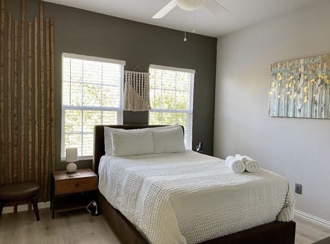 Rear right bedroom with full bed abs rollaway twin in closet.