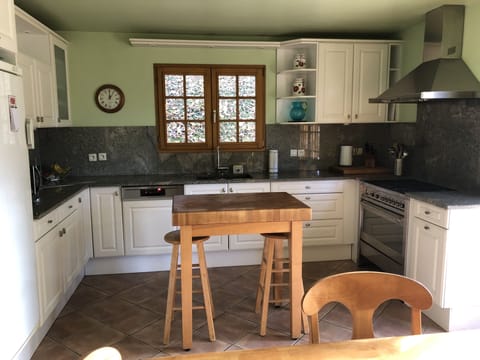 Kitchen with access to outdoor terrace