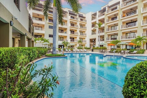 swimming pool with ample space for cooling off, lounging, and enjoying the Aruba sunshine.