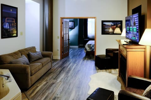 Bright living room w/ sofa bed & chairs for easy lounging.