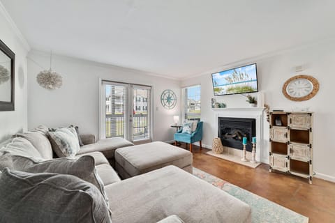 Gather in the expansive living area to make new memories with your loved ones. Enjoy the large Smart TV equipped with cable and streaming options for your viewing pleasure.