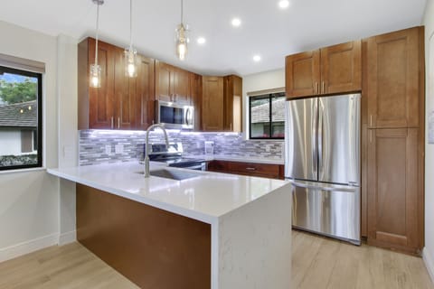 The well-equipped kitchen is ready for you to enjoy.