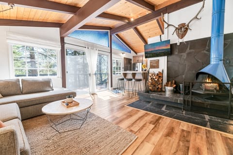 This baby blue Swedish fireplace is quite the centerpiece of the cabin anytime of the year! 