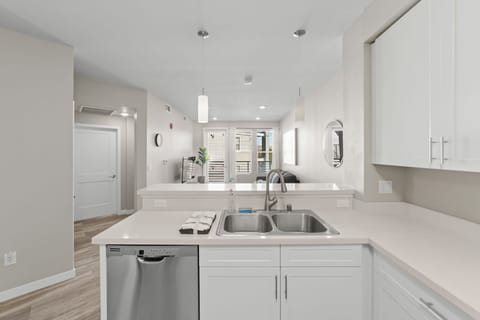 Conveniently clean up after your delicious meals with this stainless steel kitchen double sink