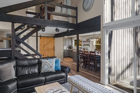 Main level features open floor plan living room, dining room and kitchen.