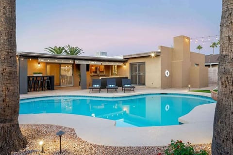 Great patio space with TV and sit up bar.