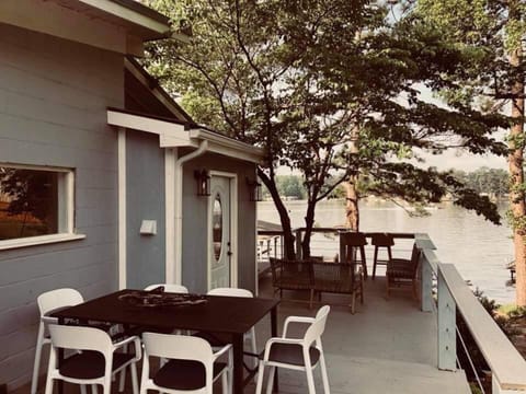 Expansive outdoor deck  provides fresh cool breeze and lake views.