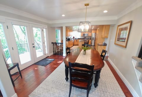 Large Dinner table with Panoramic Views off of the Main Floor Kitchen