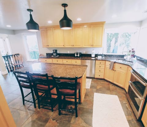 Main Floor Kitchen and bar countertop  sitting area