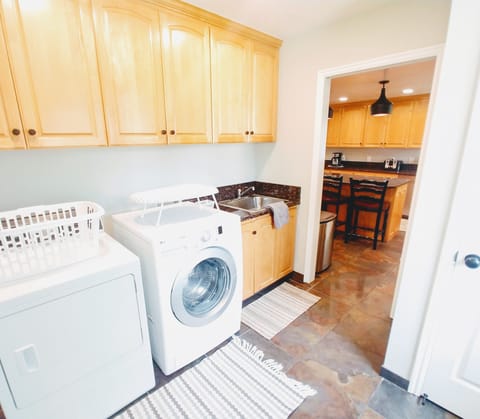 Main Floor Laundry Room and Mud Room with separate entrance off of the Kitchen 