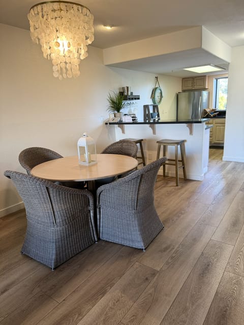 dining table, bar stools, looking toward kitchen