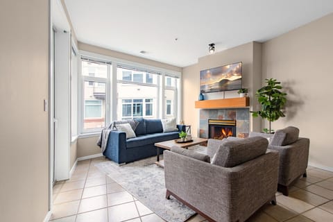 Living Room with Smart TV and Pullout Sofa-bed (Fireplace is decorative only)