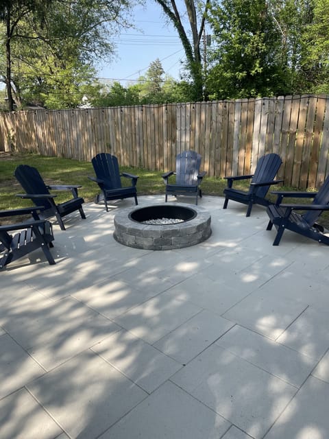 New paver patio with built in fire pit. Plenty of space to entertain friends!