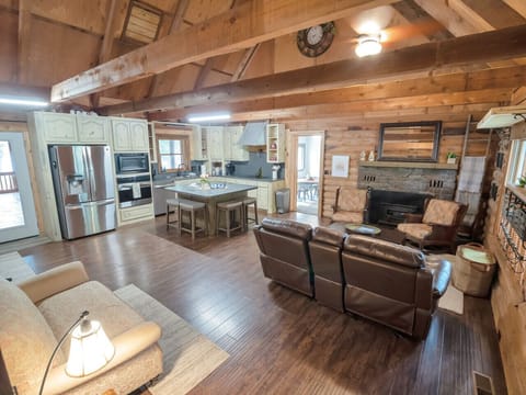 Open concept living room and fully stocked kitchen