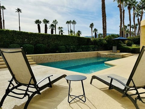 Newly resurfaced Pebbletech pool and Marbelite pool decking