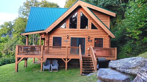 Barbeque grill at the base of the stairs.