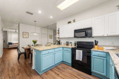 Featuring: Granite Countertops, Dining Table and Bar/Island. Seats 6, including bar. Extra seating available. Kitchen has stove, microwave, dishwasher, refrigerator and coffee maker. Newly remodeled.