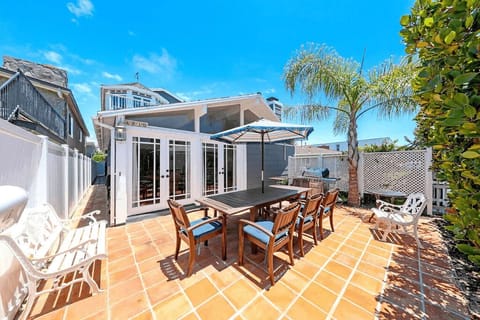 This private and cheery front patio includes seating for 6-8 along with additional seats for soaking up the sun.