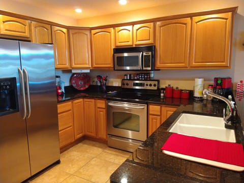 Fully equipped beautiful kitchen.Plenty of dishes, utensils and small appliances