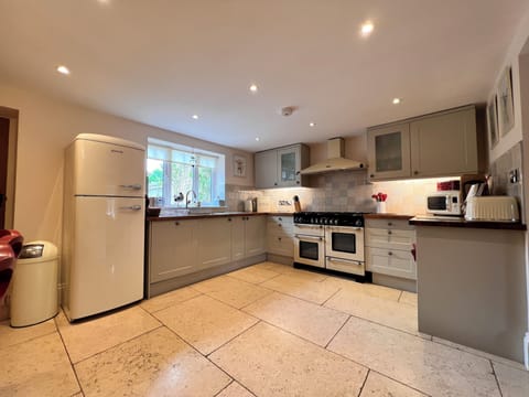 Lime stone floors and exposed brickwork showing the characteristics of this home